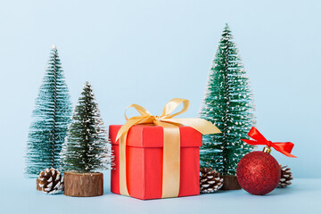 Christmas composition. craft Gift box, small tree, branches and craft DIY decorations on white background. New year concept. Christmas home decoration Flat lay, top view, copy space