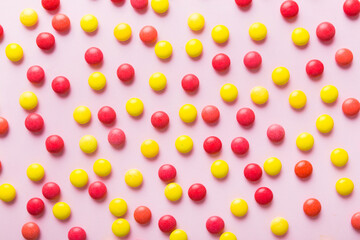 colorful candies as background top view. Seamless pattern with candy. Many sweet candies close-up