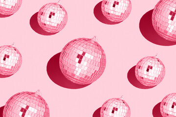 Color of the year 2023 viva magenta..Shiny disco balls. Creative Christmas pattern. 90s retro party...