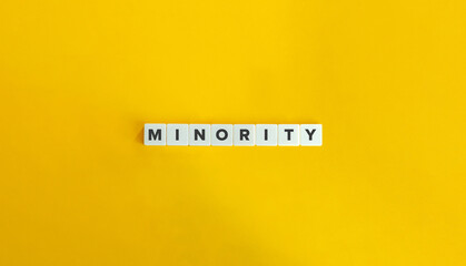 Minority Word on Block Letter Tiles on Yellow Background. Minimal Aesthetics.