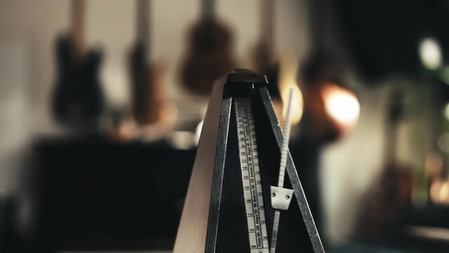Mechanical metronome for music rhythm and tact measuringworking with sound. Classical tool for musicians and song creators