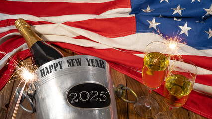 New Year 2025 New Year's Eve Sylvester holiday celebration background USA greeting card - American flag, sparkling wine or champagnebucket, bottle and glasses and sparklers on wooden table, top view