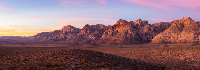 Panoramic shot of Red Rock Canyon at colorful sunrise near Las Vegas, Nevada © Sean Miller/Wirestock Creators