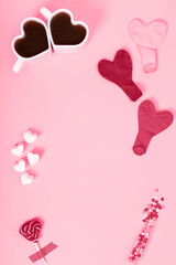 Concept gifts for your loved ones, for valentines day, womens day, mothers day or birthday. Two cups of cocoa marshmallow in shape of heart and candy. Copy space. Top view