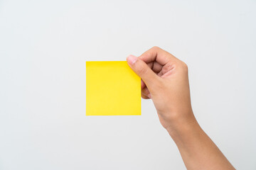 Women hand hold yellow adhesive note - 550862135
