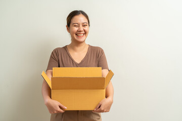 Asian women holding parcel box package, shipment service and delivery courier concept