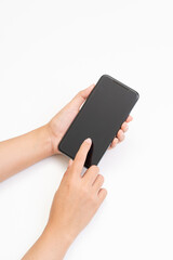 Women hands holding smartphone on white background.