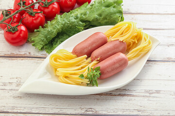 Mini sausages with pasta spaghetti