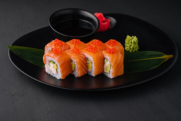 Philadelphia sushi rolls with caviar on plate