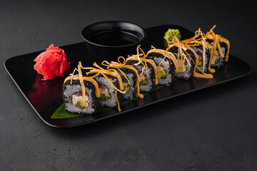 Sushi rolls with tuna and black caviar