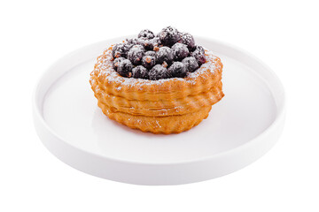 Dessert fruit cake with currant on white