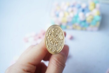 Metal wax stamp for making wax coins