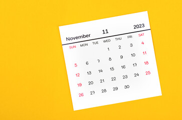 The November 2023 Monthly calendar for 2023 year on yellow background.