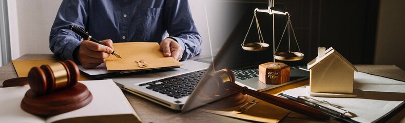 Business and lawyers discussing contract papers with brass scale on desk in office. Law, legal...