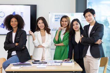 Diverse colleagues working together and people in business organization. Group of young startup...