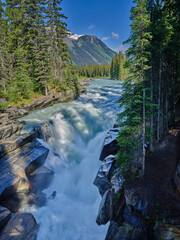 smooth glacial rocks in a small tight canyon near Jasper Canada