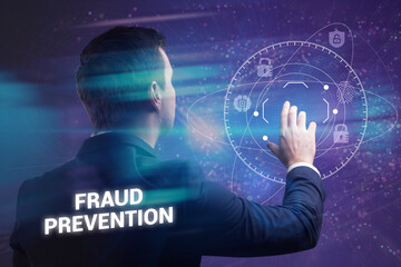 Business, Technology, Internet and network concept. Young businessman working on a virtual screen of the future and sees the inscription: Fraud prevention