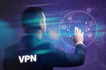 Business, Technology, Internet and network concept. Young businessman working on a virtual screen of the future and sees the inscription: VPN