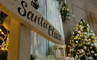 Vintage House Decoration Concept Of Signpost With Santa Claus Inscription 
