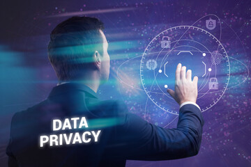 Business, Technology, Internet and network concept. Young businessman working on a virtual screen of the future and sees the inscription: Data privacy