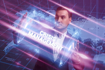 Business, Technology, Internet and network concept. Young businessman working on a virtual screen of the future and sees the inscription: Сrisis management