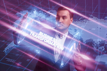 Obraz na płótnie Canvas Business, Technology, Internet and network concept. Young businessman working on a virtual screen of the future and sees the inscription: Business transformation