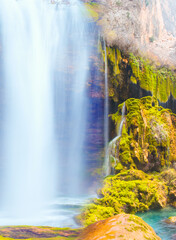 Amazing view of natural Yerkopru waterfall with crystal clear water among green mosses - Mersin, Turkey