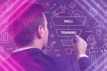 Business, Technology, Internet and network concept. Young businessman working on a virtual screen of the future and sees the inscription: Skill training