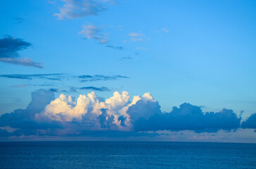 Naklejka na ściany i meble Large clouds with blue sky in the background
