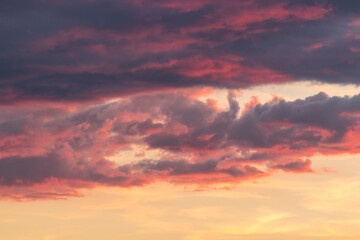 Fototapeta na wymiar Colorful cloudy sky at sunset. Gradient color. Sky texture, abstract nature background