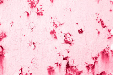 Viva Magenta wall with dirty scratches and metal stains. Metal rust monochrome background. Color of the 2023 year.