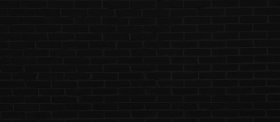 Black wall texture background The surface of the brick dark jagged. or abstract black wall background
