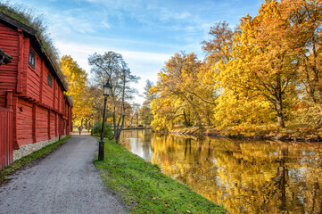 River Svartån and historic Wadköping during autumn in Örebro, Sweden - 550896172