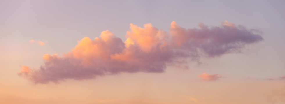 Sky background with big cloud at sunset