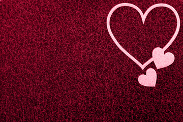 Obraz premium Pantone color 2023 viva magenta. texture background and harts. valentine day card and concept. place for text. Flat lay composition