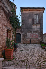 Fototapeta na wymiar A narrow street in Pietramelara, a medieval village in Caserta province, Italy.