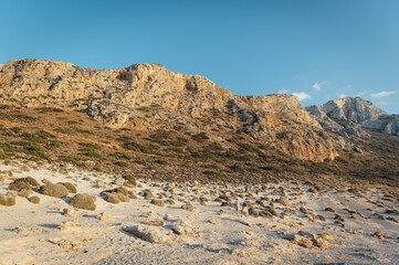 Yellow sand, rocky landscape and mediterranean sea in Crete. Incredible landscapes of Greece