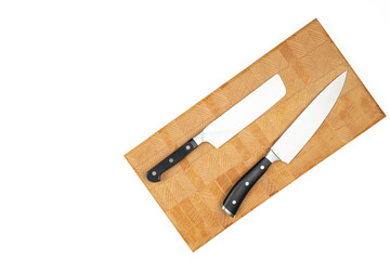 Cook Knife on the wooden endgrain cutting board above white background
