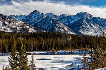 Bow river flows below the Bow Range. Banff National Park, Alberta, Canada