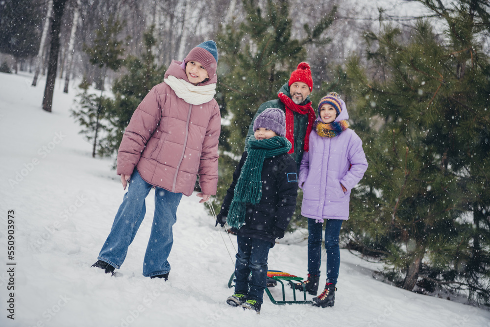 Poster photo of funky cheerful little child wife husband dressed coats having fun winter activities togethe