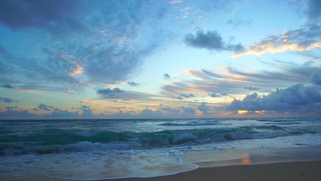 Clouds are moving slowly in the sky during sunset at Karon beach Phuket.video 4K..Nature video High quality footage. .Scene of Colorful romantic sky sunset with cloud in the sky background..