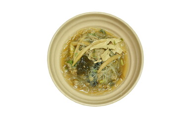 boiled glass noodles topping gypsum tofu with mashed pork and ear mushroom soup on bowl 