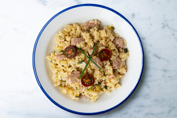 Italian risotto recipe with sausage and zucchini.