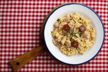 Italian risotto recipe with sausage and zucchini.