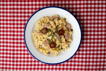 Italian risotto recipe with sausage and zucchini.