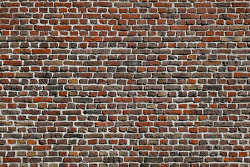 A rough brick masonry wall