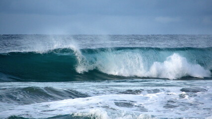Waves breaking on the beach in Zipolite, Mexico