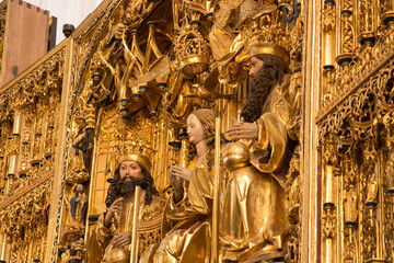 Fototapeta na wymiar Gdansk, Poland, May 15, 2022: Interior of St. Mary's Basilica in Gdansk.. Main altar: Coronation of the Blessed Virgin Mary.