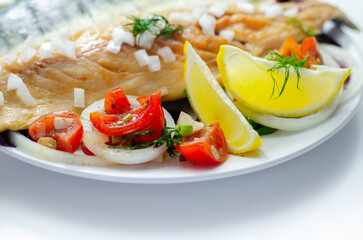 Hot smoked scottish mackerel fillets with onions, tomato and salad