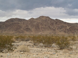 dramatic heavy stormy sky and light over mountains